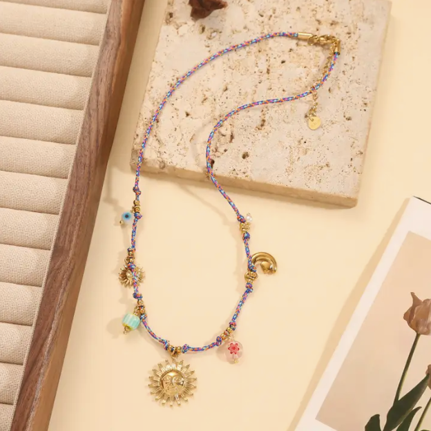 Braided Golden Necklace with Sun Charms