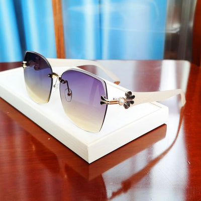 Rimless Butterfly Lens Sunglasses with Deco Pearl Detail